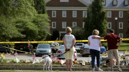 VIRGINIA BEACH, VIRGINIA - JUNE 02: People stop to pay their respects to those killed in a mass shooting at a makeshift memorial outside the City of Virginia Beach Operations Building June 02, 2019 in Virginia Beach, Virginia. Eleven city employees and one private contractor were shot to death Friday in the operations building by engineer DeWayne Craddock who had worked for the city for 15 years. (Photo by Chip Somodevilla/Getty Images)