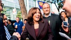 SAN FRANCISCO, CA - June 1: Senator Kamala Harris, with husband Douglas Emhoff, right, is cheered on by supporters outside the 2019 California Democratic Party State Organizing Convention at the Moscone Center in San Francisco, California Saturday June 1, 2019. (Photo by Melina Mara/The Washington Post via Getty Images)