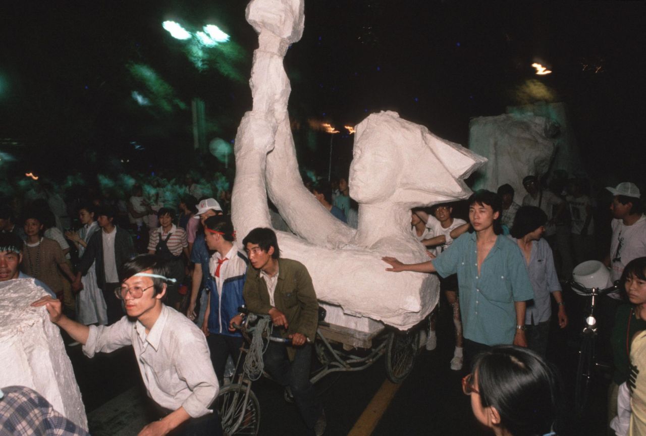 Part of the statue being transported to Tiananmen Square.