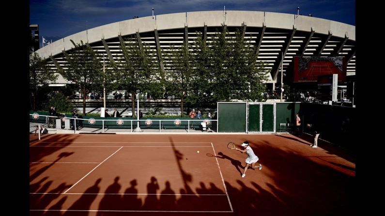 Kurumi Nara plays a backhand return to Slovenia's Dalila Jakupovic during their women's singles first round match on day two of the French Open in Paris, France on Monday, May 27.
