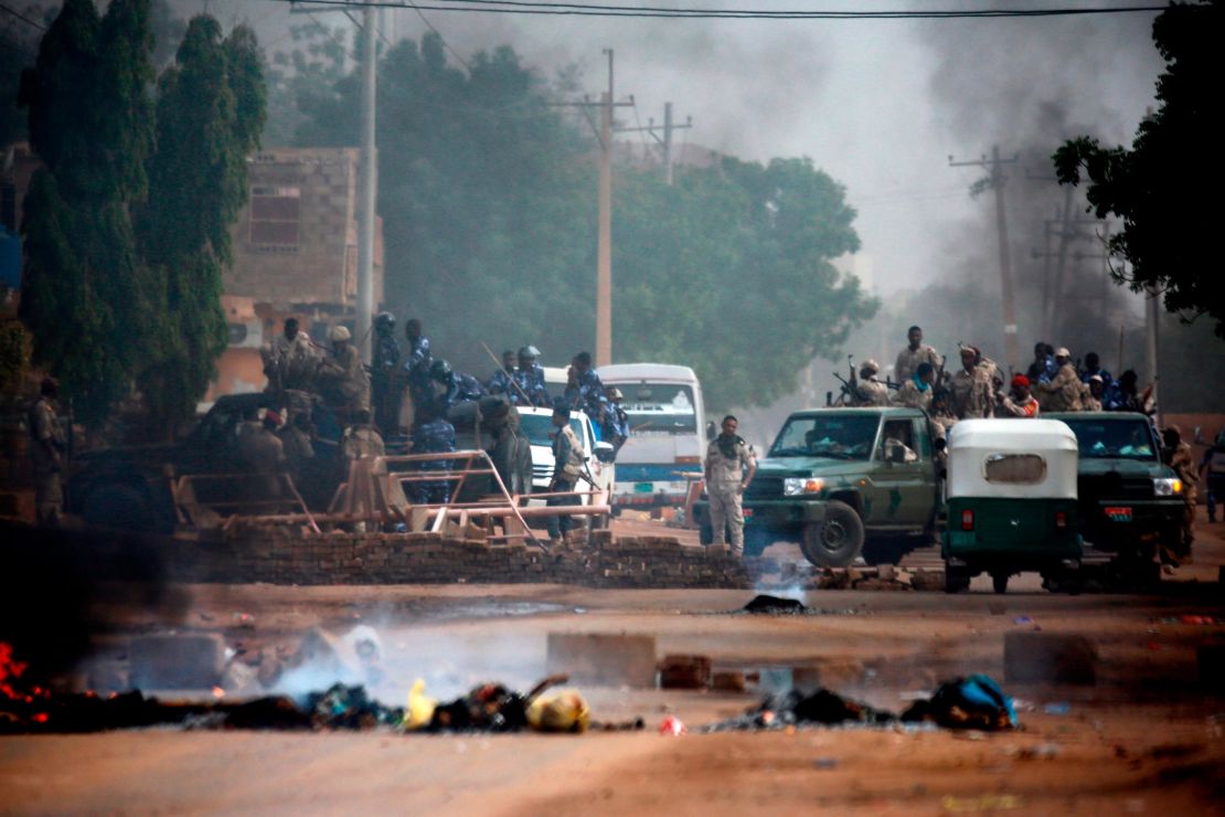 Sudanese forces are deployed around Khartoum's army headquarters on June 3 as they try to disperse Khartoum's sit-in. 