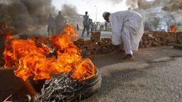 Sudanese protesters close Street 60 with burning tyres and pavers as military forces tried to disperse the sit-in outside Khartoum's army headquarters on June 3, 2019. - At least two people were killed Monday as Sudan's military council tried to break up a sit-in outside Khartoum's army headquarters, a doctors' committee said as gunfire was heard from the protest site. (Photo by ASHRAF SHAZLY / AFP)        (Photo credit should read ASHRAF SHAZLY/AFP/Getty Images)