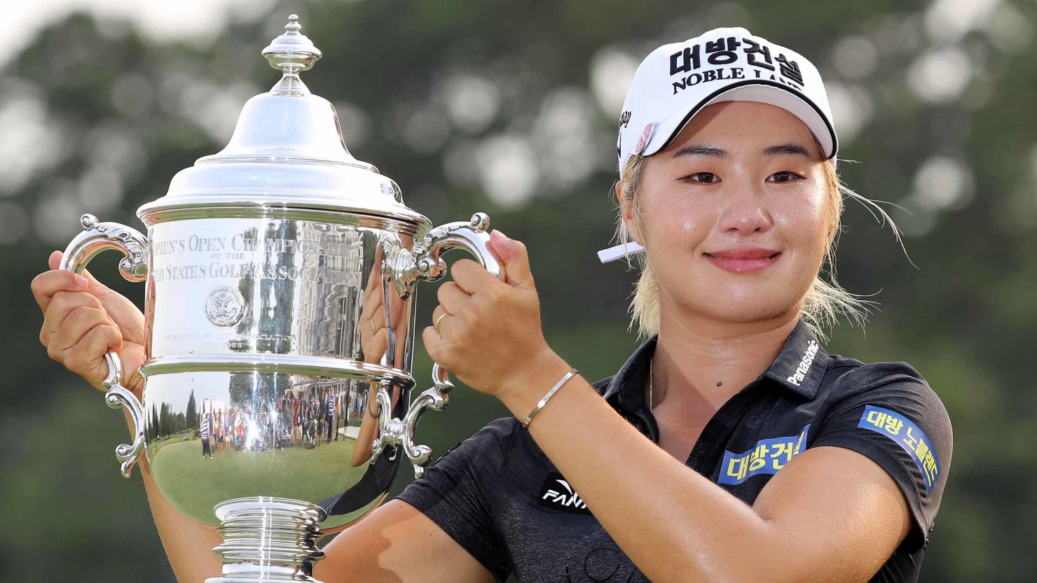 Jeongeun Lee6 of South Korea celebrates with the trophy after winning the US Women's Open in Charleston, South Carolina.