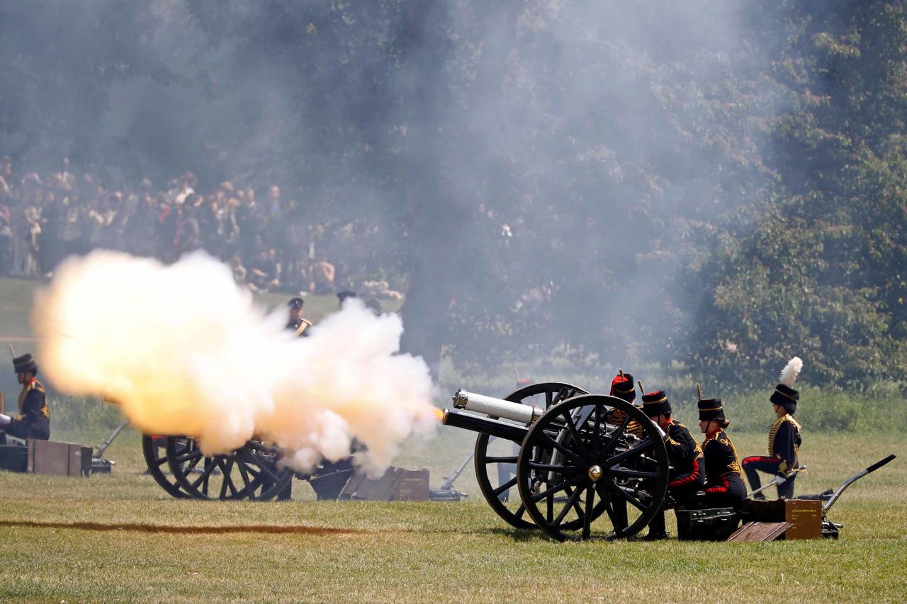 British Army troops fire a cannon in London's Green Park to mark the beginning of Trump's visit.