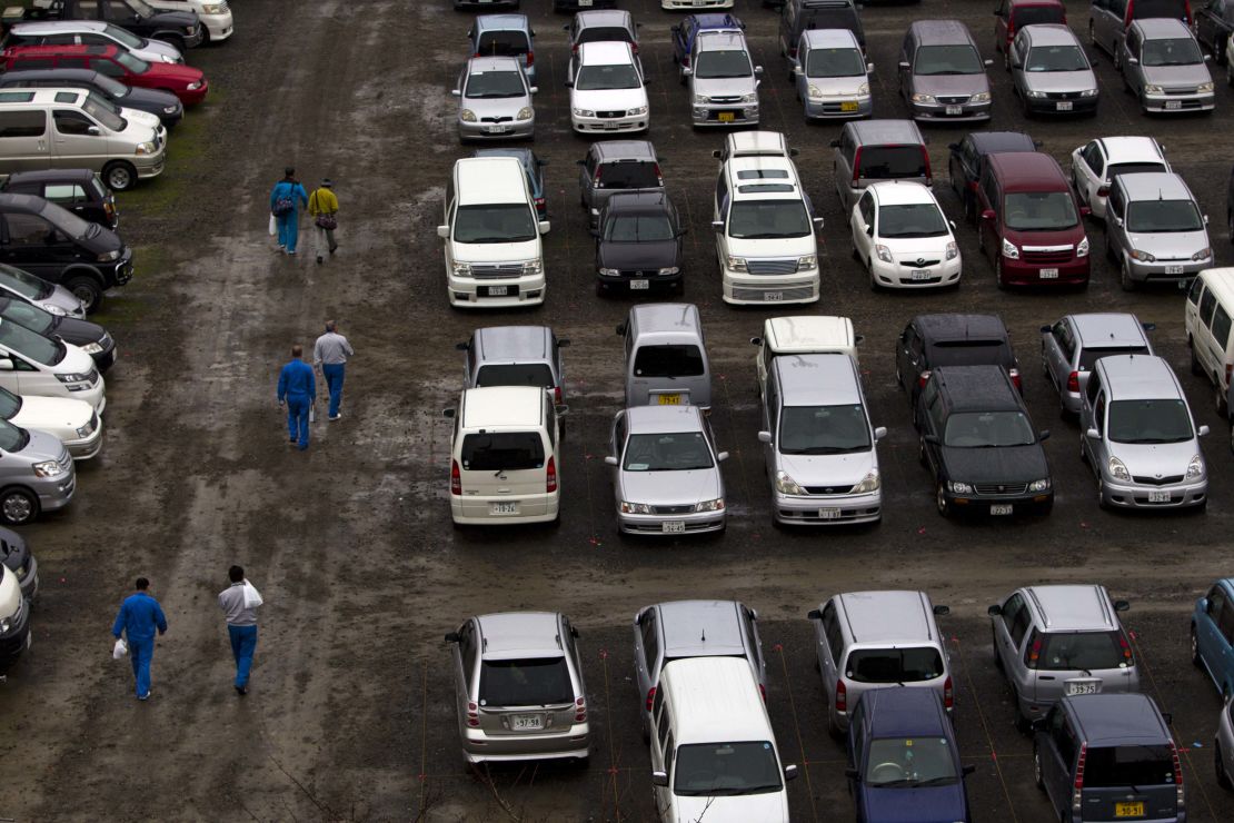 Vehicles are seen parked on the football pitches at the training center in November 2011.