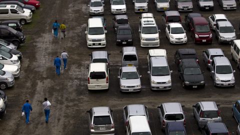 Vehicles are seen parked on the football pitches at the training center in November 2011.