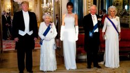 Britain's Queen Elizabeth II (2L), US President Donald Trump (L), US First Lady Melania Trump (C), Britain's Prince Charles, Prince of Wales (2R) and Britain's Camilla, Duchess of Cornwall pose for a photograph ahead of a State Banquet in the ballroom at Buckingham Palace in central London on June 3, 2019, on the first day of the US president and First Lady's three-day State Visit to the UK. - Britain rolled out the red carpet for US President Donald Trump on June 3 as he arrived in Britain for a state visit already overshadowed by his outspoken remarks on Brexit. (Photo by Doug Mills / POOL / AFP)        (Photo credit should read DOUG MILLS/AFP/Getty Images)