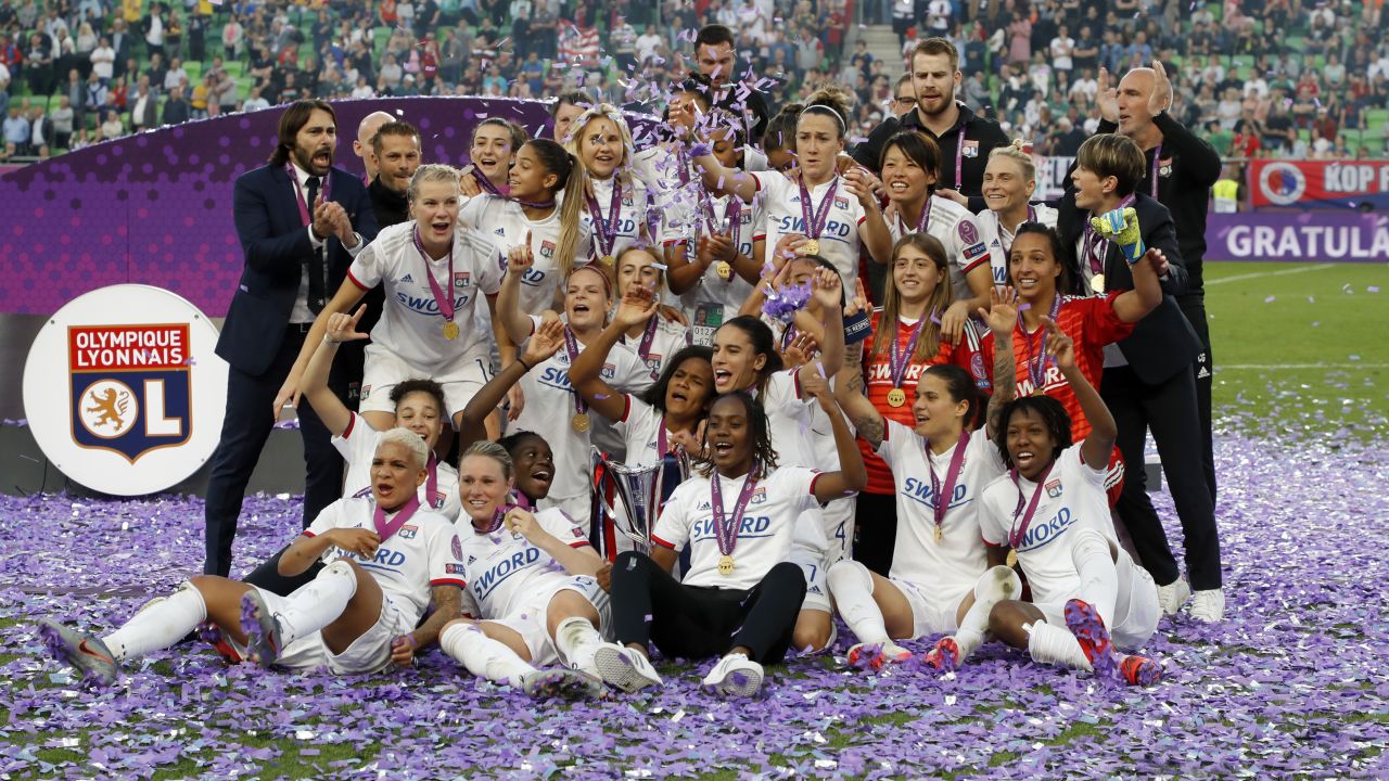 Lyon celebrates beating Barcelona in Budapest.