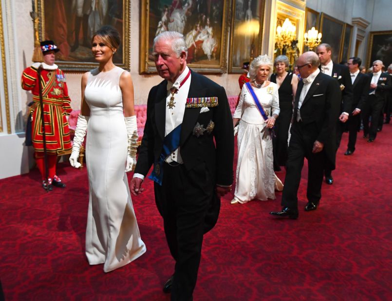 Melania Trump wore a custom white couture gown from Christian Dior, while Camilla wore British designer Bruce Oldfield.