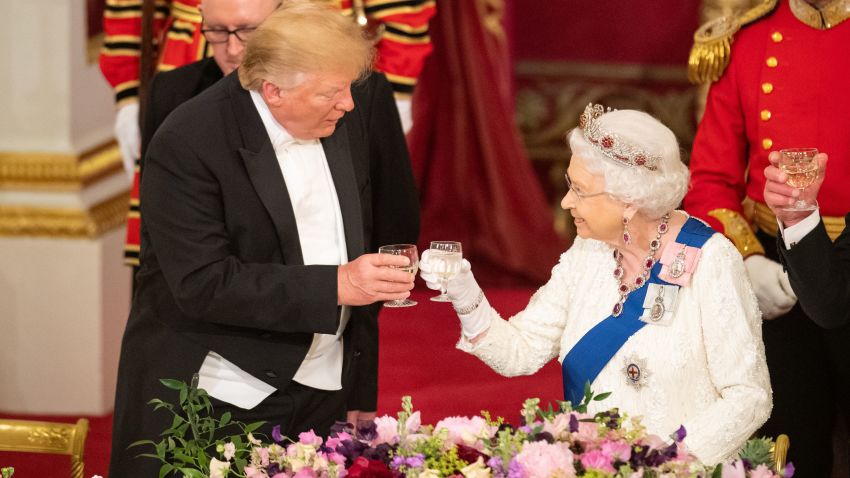 Britain's Queen Elizabeth II (R) raises a glasses with US President Donald Trump during a State Banquet in the ballroom at Buckingham Palace in central London on June 3, 2019, on the first day of the US president and First Lady's three-day State Visit to the UK. - Britain rolled out the red carpet for US President Donald Trump on June 3 as he arrived in Britain for a state visit already overshadowed by his outspoken remarks on Brexit. (Photo by Dominic Lipinski / POOL / AFP)        (Photo credit should read DOMINIC LIPINSKI/AFP/Getty Images)