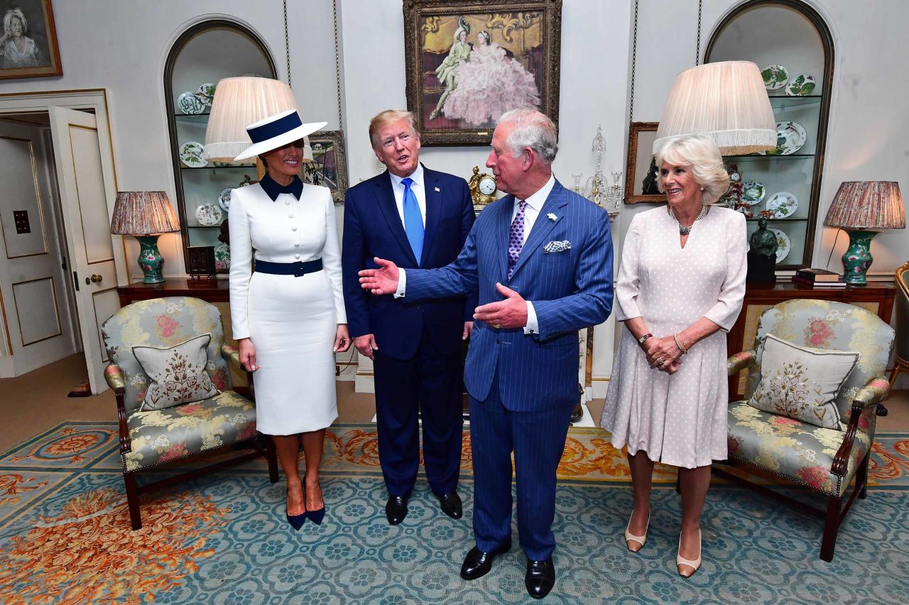 The Trumps are welcomed in London by Charles and Camilla.
