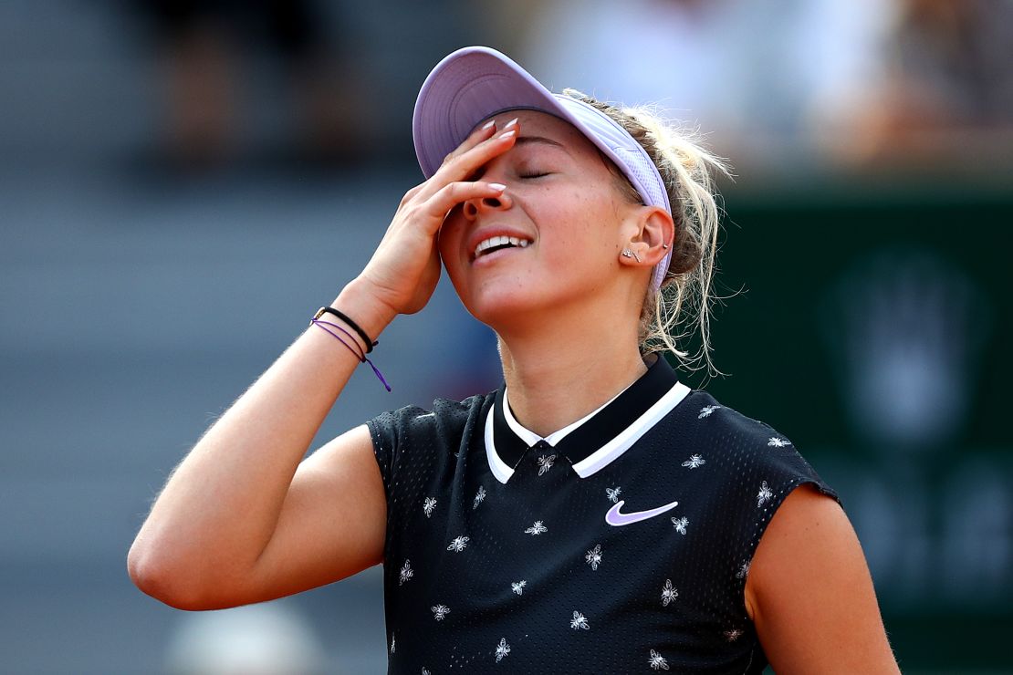 Anisimova reacts to defeating Halep in Paris.