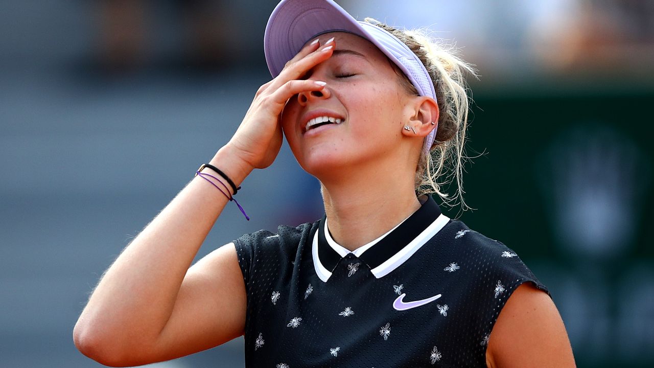 Anisimova reacts to defeating Halep in Paris.