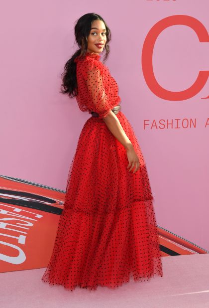 One of the best-dressed stars at this year's Hollywood red carpets, Laura Harrier once again impressed in red tulle gown by Catherine Holstein's brand, Khaite.