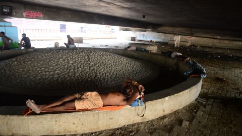 An Indian man rests under a bridge during a hot summer afternoon in Allahabad on Sunday, June 2.