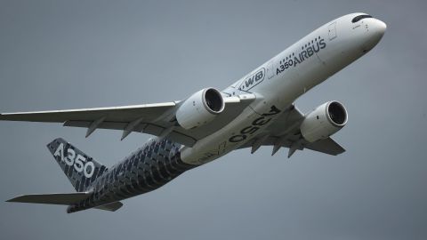 SCHOENEFELD, GERMANY - APRIL 25:  An Airbus A350-900 passenger plane flies at the ILA Berlin Air Show on April 25, 2018 in Schoenefeld, Germany. ILA Berlin is Europe's third largest air show and will be open to the general public from April 27-29.  (Photo by Sean Gallup/Getty Images)