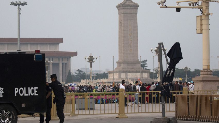 Visitors gather around the Monument to the People's Heroes on Tiananmen Square during the 30th anniversary of a bloody crackdown of pro-democracy protesters in Beijing on Tuesday, June 4, 2019. Critics say the 1989 Tiananmen crackdown, which left hundreds, possibly thousands, dead, set the ruling Communist Party on its present course of ruthless suppression, summary incarceration and the frequent use of violence against opponents in the name of "stability maintenance." (AP Photo/Ng Han Guan)