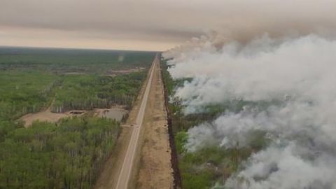 Smoke rises from a wildfire in High Level, Alberta, Canada, on May 22.