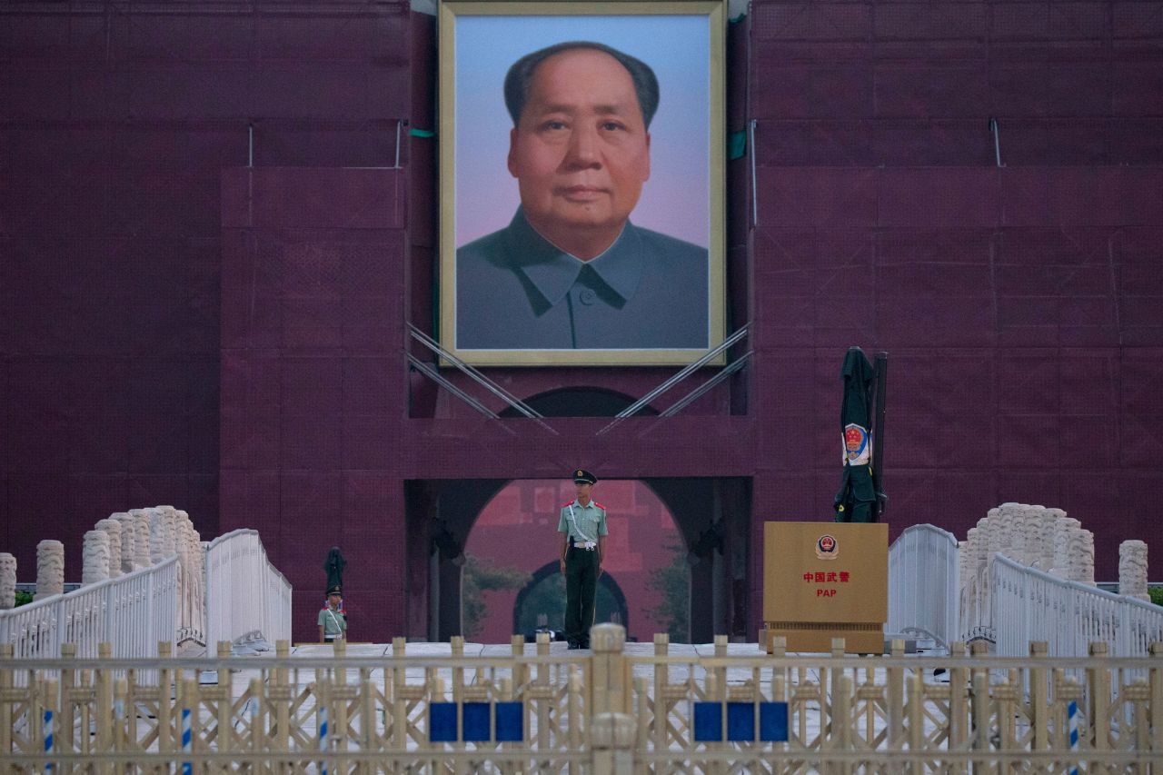 A Chinese paramilitary police officer stands guard in front of Mao Zedong's portrait on Beijing's Tiananmen Gate on Tuesday.