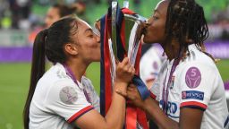 Lyon players kiss the trophy after the UEFA Women's Champions League final football match Lyon v Barcelona in Budapest on May 18, 2019. (Photo by Attila KISBENEDEK / AFP)        (Photo credit should read ATTILA KISBENEDEK/AFP/Getty Images)