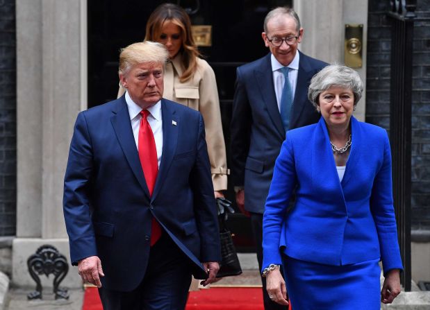 Trump and May are followed by their spouses as they make their way to the news conference in London on June 4. The President <a href="index.php?page=&url=https%3A%2F%2Fwww.cnn.com%2F2019%2F06%2F04%2Fpolitics%2Ftrump-theresa-may-brexit-trade%2Findex.html" target="_blank">offered plenty of praise for May,</a> who recently announced her resignation. 