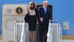 US President Donald Trump (R) and US First Lady Melania Trump (L) disembark Air Force One at Stansted Airport, north of London on June 3, 2019, as they begin a three-day State Visit to the UK. - Britain rolled out the red carpet for US President Donald Trump on June 3 as he arrived in Britain for a state visit already overshadowed by his outspoken remarks on Brexit. (Photo by Isabel Infantes / AFP)        (Photo credit should read ISABEL INFANTES/AFP/Getty Images)