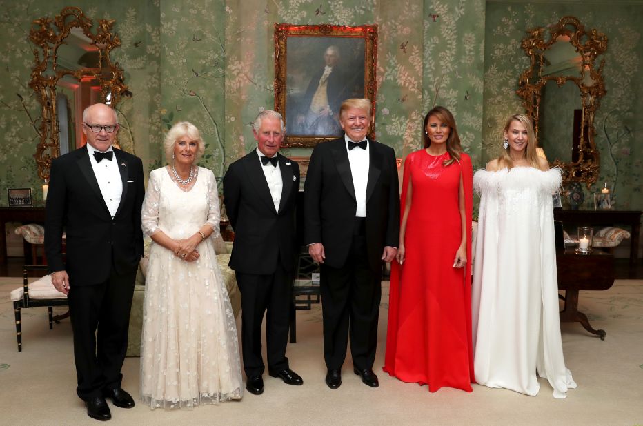 The Trumps pose for a photo ahead of a dinner at Winfield House in London on Tuesday, June 4. Joining them, from left, are Woody Johnson, the US ambassador to the United Kingdom; Camilla, the Duchess of Cornwall; Prince Charles; and Johnson's wife, Suzanne Ircha.