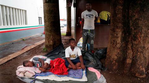 A family of Haitian migrants waits at an immigration center in Tapachula, Mexico, on May 29, 2019.