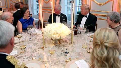 White House Press Secretary Sarah Huckabee Sanders, (2L), Britain's Prince Charles , Prince of Wales (C), US President Donald Trump (2R) and Britain's Prime Minister Theresa May attend a dinner Winfield House, the residence of the US Ambassador, where US President Trump is staying whilst in London, on June 4, 2019, on the second day of the US President's three-day State Visit to the UK.
