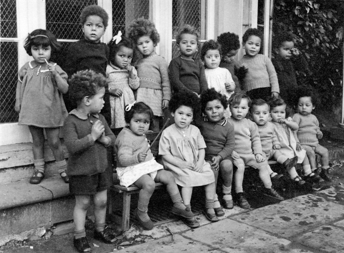 Carol Edwards (back row, fourth from left) and  Deborah Prior (front row, third from left) remember their time at Holnicote House in Somerset, southwest England, with great affection.