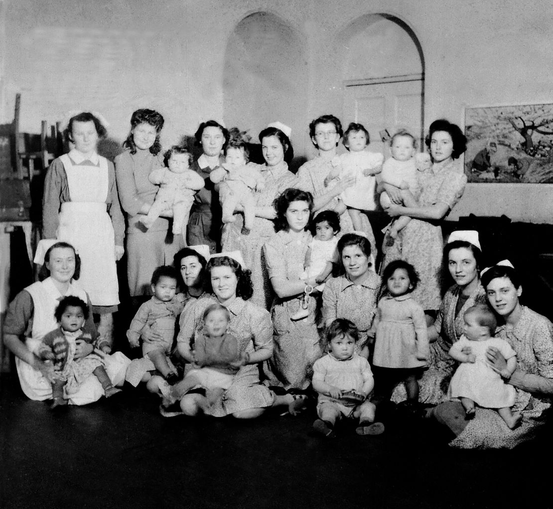 GI babies who grew up in care, like these at Holnicote House, seen here with the nurses who cared for them, were regularly photographed in an attempt to find adoptive families.