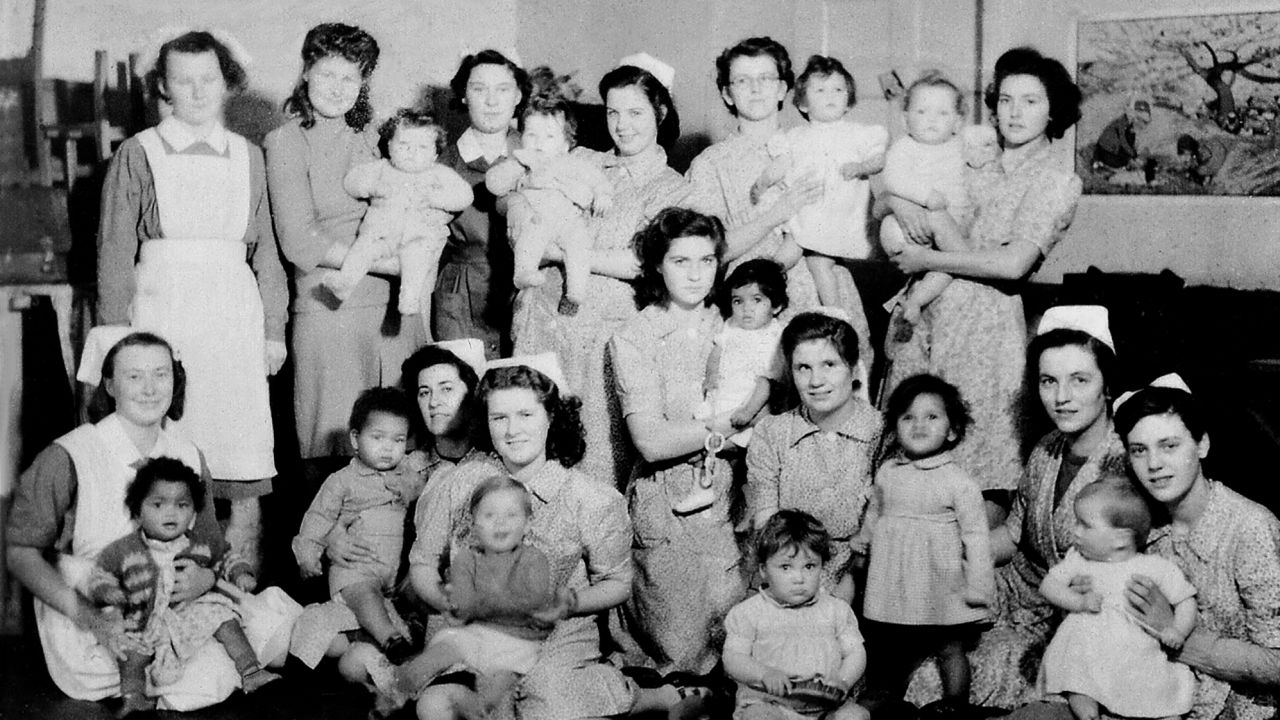 GI babies who grew up in care, like these at Holnicote House, seen here with the nurses who cared for them, were regularly photographed in an attempt to find adoptive families.