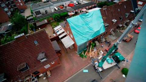 A tarp covers a damaged roof Wednesday in Bocholt in the wake of the storm.