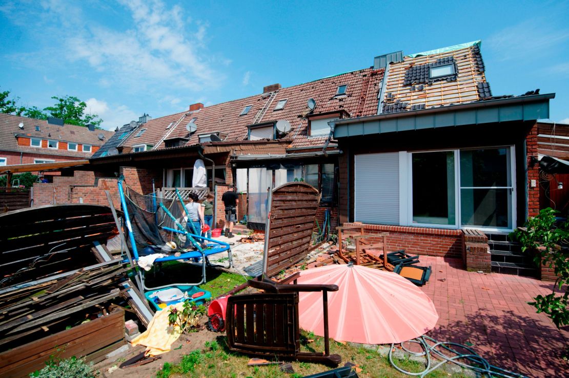 The remains of a roof lie in the garden of a property Wednesday in Bocholt. 
