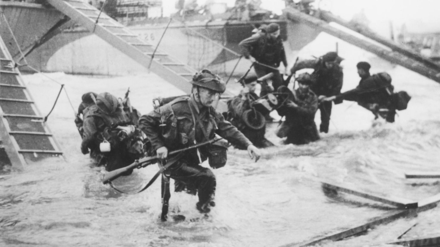 Troops from the 48th Royal Marines disembark on Juno Beach during the D-Day landings on June 6, 1944.