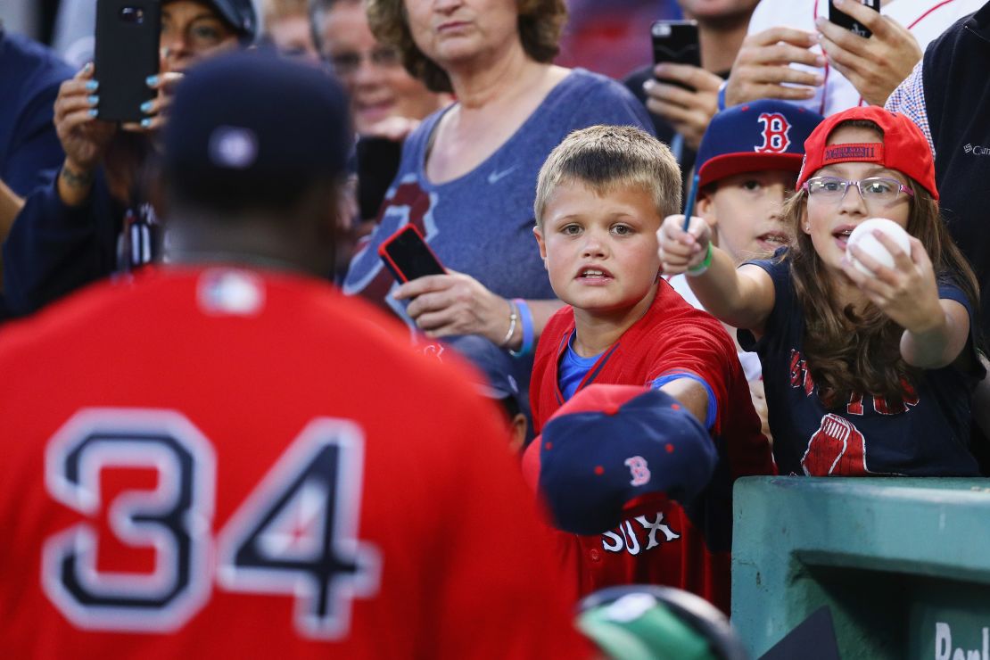 Boston fans ask for an autograph from 10× All-Star David Ortiz.