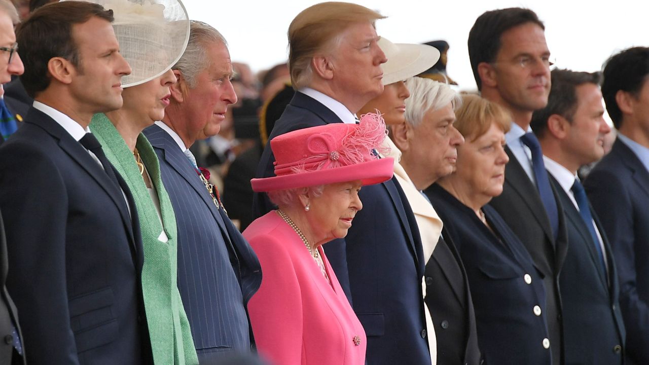 From left: French President Emmanuel Macron , Britain's Prime Minister Theresa May, Britain's Prince Charles, Prince of Wales, Britain's Queen Elizabeth II, US President Donald Trump, US First Lady Melania Trump, Greek President Prokopis Pavlopoulos, German Chancellor Angela Merkel, Dutch Prime Minister Mark Rutte, and  Luxembourg's Prime Minister Xavier Bettel attend an event to commemorate the 75th anniversary of the D-Day landings, in Portsmouth, southern England, on June 5, 2019. - US President Donald Trump, Queen Elizabeth II and 300 veterans are to gather on the south coast of England on Wednesday for a poignant ceremony marking the 75th anniversary of D-Day. Other world leaders will join them in Portsmouth for Britain's national event to commemorate the Allied invasion of the Normandy beaches in France -- one of the turning points of World War II. (Photo by Mandel NGAN / AFP)        (Photo credit should read MANDEL NGAN/AFP/Getty Images)