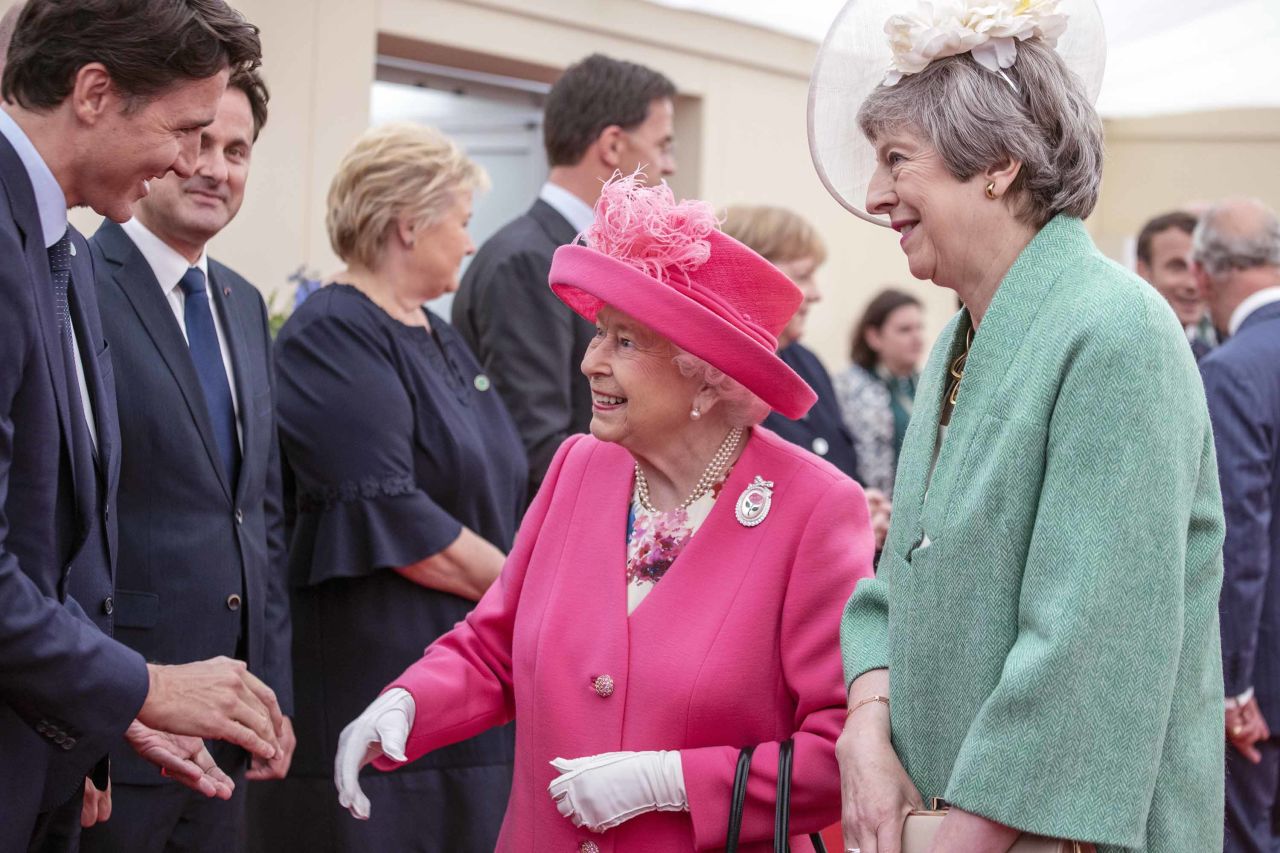 Elizabeth, accompanied by May, greets Canadian Prime Minister Justin Trudeau during a meeting of Allied leaders in Portsmouth on June 5.