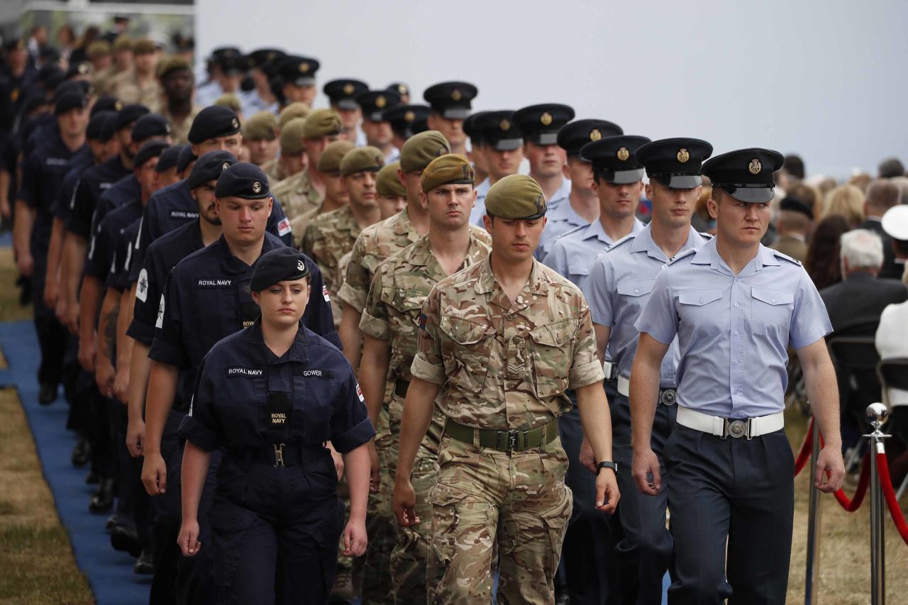 Troops arrive at the Portsmouth ceremony on June 5.