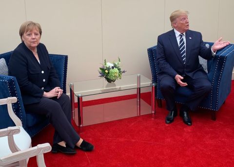 Trump meets with German Chancellor Angela Merkel on the sidelines of the D-Day event in Portsmouth.
