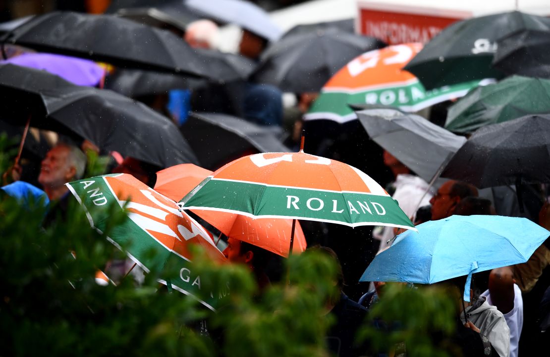 The umbrellas were out at the French Open Wednesday due to steady rain that canceled play. 