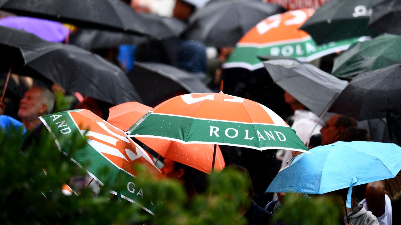 The umbrellas were out at the French Open Wednesday due to steady rain that canceled play. 