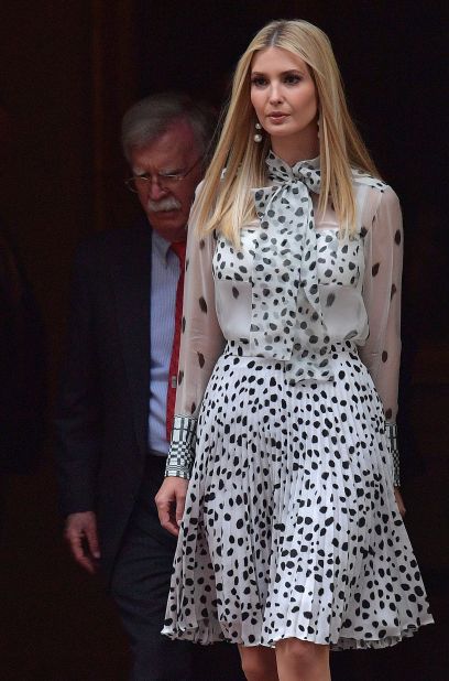 Ivanka Trump leaves 10 Downing Street in a polka-dot top and matching skirt from Burberry.