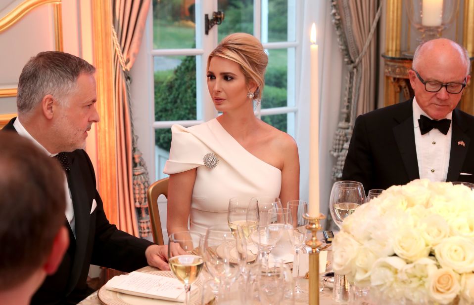 Ivanka Trump wears a one-shouldered dress by Safiyaa to the dinner at the ambassador's residence.