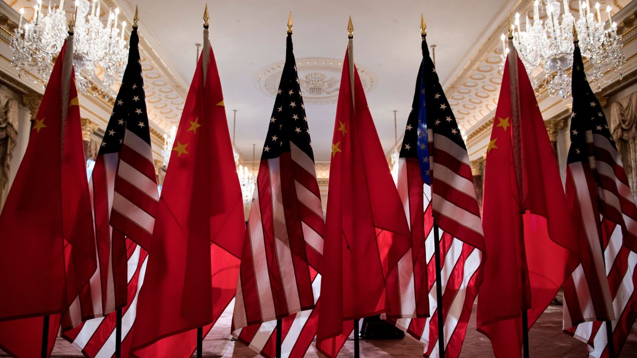 US and Chinese flags are seen as Secretary of State Mike Pompeo and China's Foreign Minister Wang Yi  meet at the US Department of State May 23, 2018 in Washington, DC. (Photo by Brendan Smialowski / AFP)        (Photo credit should read BRENDAN SMIALOWSKI/AFP/Getty Images)