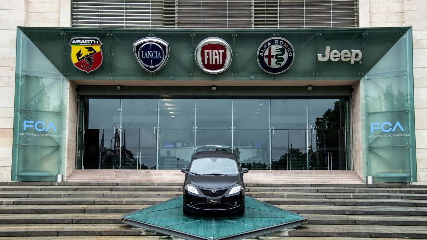 The logos of automobile companies (LtoR) Abarth, Lancia, Fiat, Alfa Romeo and Jeep are pictured at the entrance to the Fiat Chrysler Automobiles (FCA) at the Fiat Mirafiori car plant on May 27, 2019 in Turin, northern Italy. - French and Italian-US auto giants Renault and Fiat Chrysler are set to announce talks on an alliance, with a view to a potential merger, informed sources said on May 26, 2019. (Photo by MARCO BERTORELLO / AFP)        (Photo credit should read MARCO BERTORELLO/AFP/Getty Images)