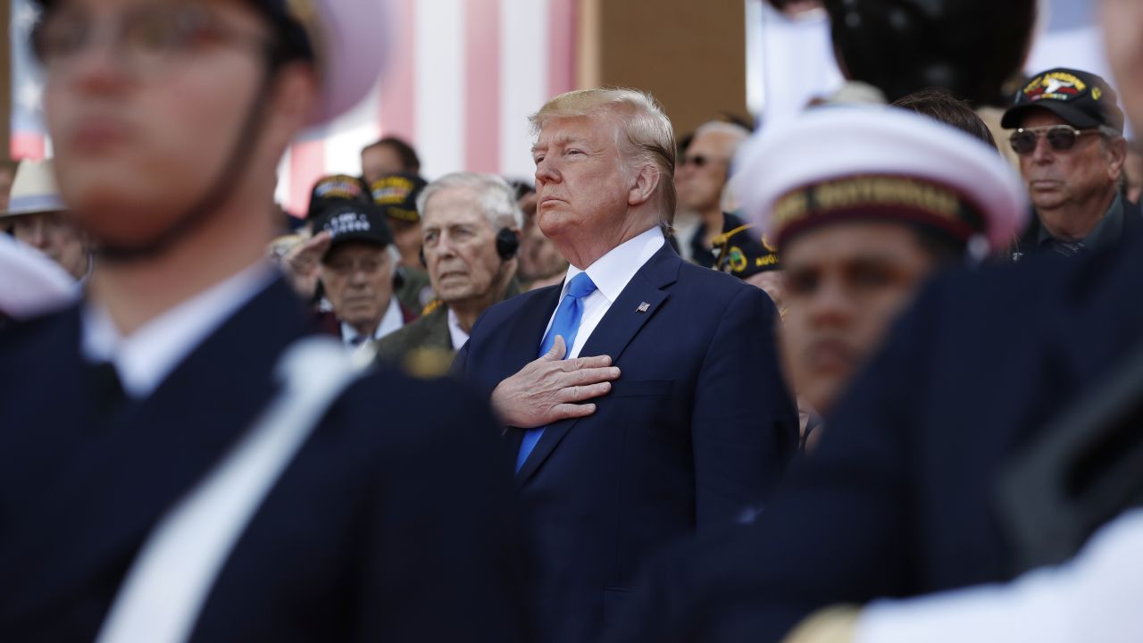 US President Donald Trump, visiting the Normandy American Cemetery in France, participates in a ceremony to commemorate the 75th anniversary of D-Day on Thursday, June 6.