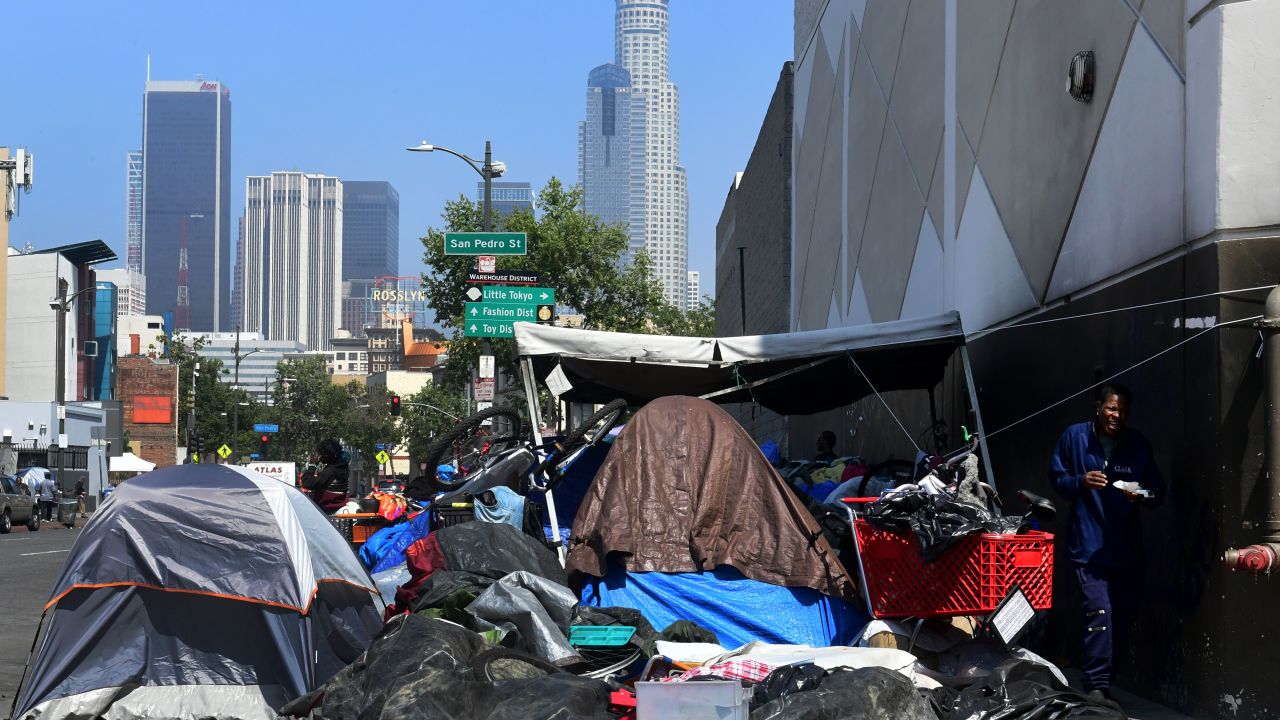 Belongings of the homeless crowd a downtown Los Angeles sidewalk in Skid Row on May 30, 2019. - The city of Los Angeles on May 29 agreed to allow homeless people on Skid Row to keep their property and not have it seized, providing the items are not bulky or hazardous. (Photo by Frederic J. BROWN / AFP)        (Photo credit should read FREDERIC J. BROWN/AFP/Getty Images)