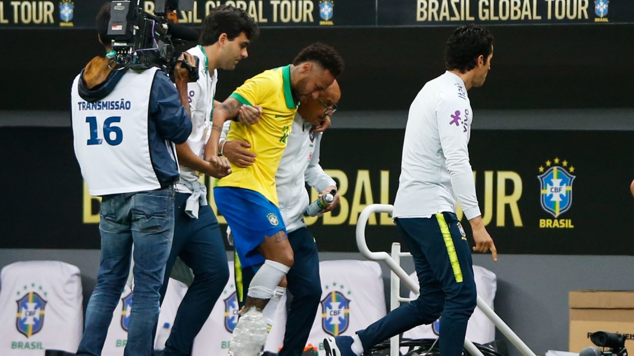 Neymar limped off during Brazil's 2-0 win over Qatar in Brasilia.