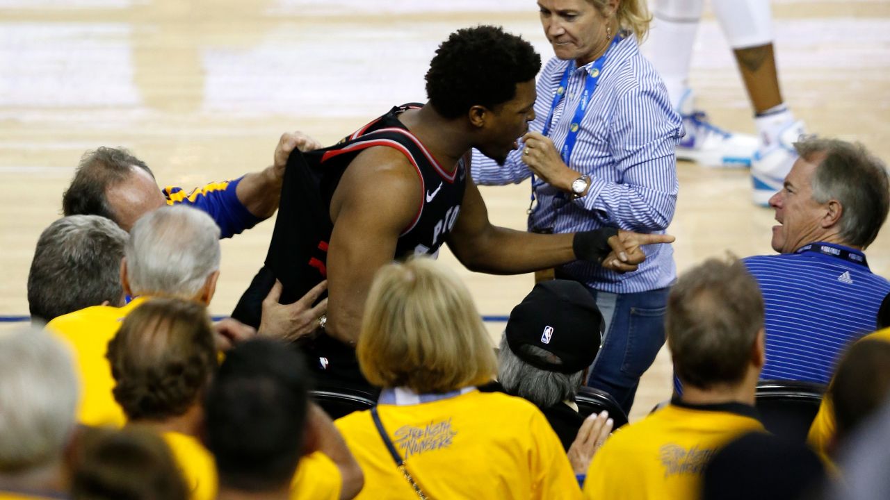 Kyle Lowry yells at Warriors investor Mark Stevens during Game 3 of the NBA Finals in Oakland, California.